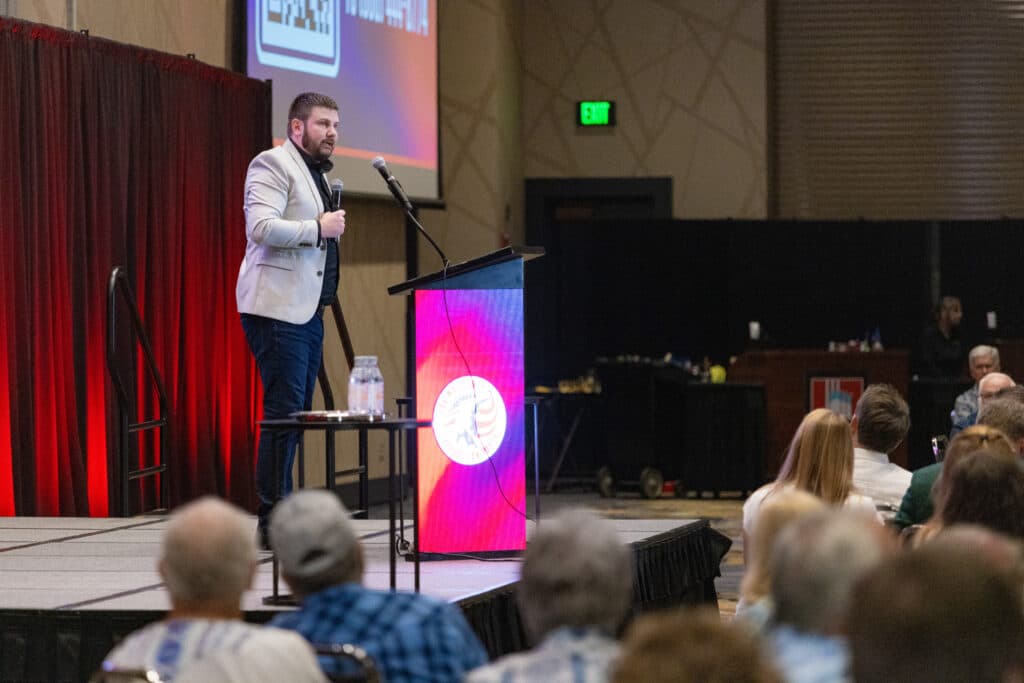 Dale Whitaker speaking at an event